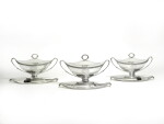 A set of three George III silver sauce tureens, covers and stands, Daniel Smith and Robert Sharp, London, 1787