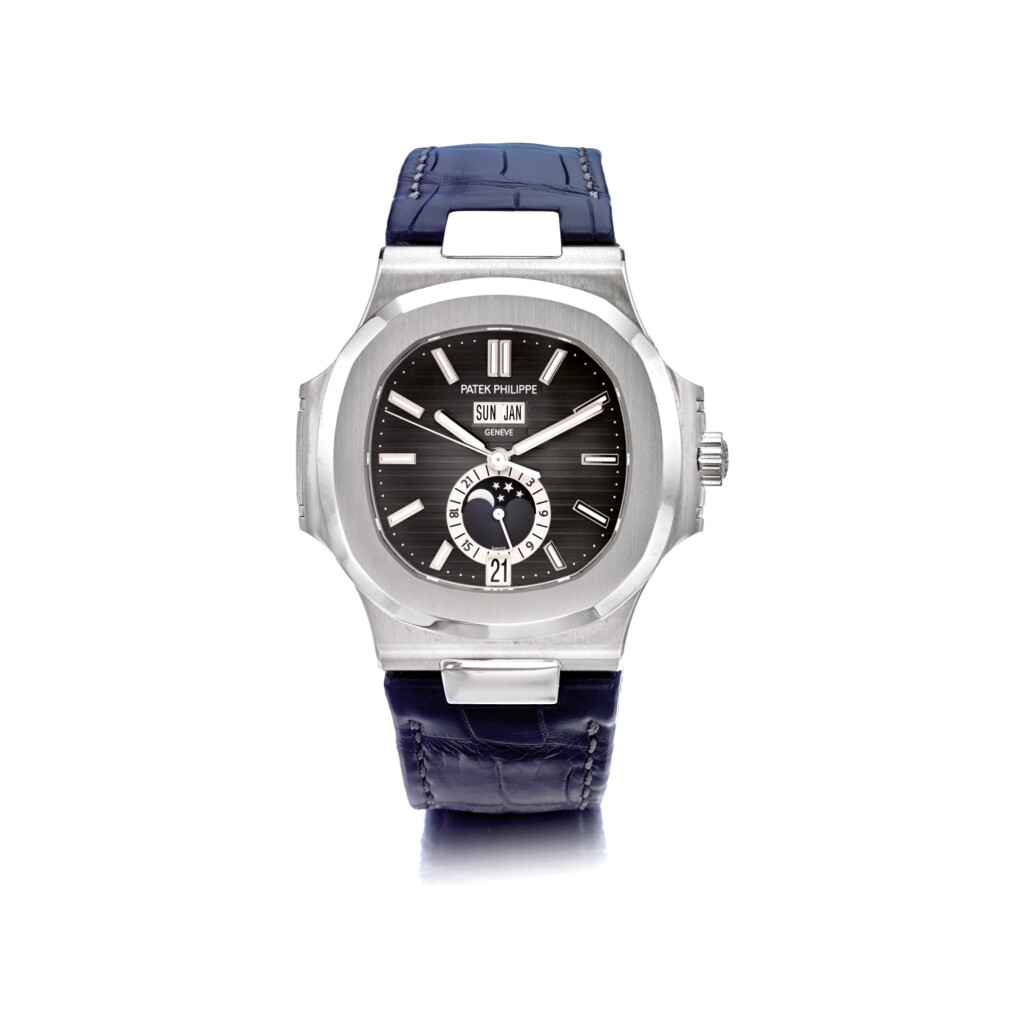 View full screen - View 1 of Lot 823. PATEK PHILIPPE | REF 5726A NAUTILUS, A STAINLESS STEEL AUTOMATIC ANNUAL CALENDAR WRISTWATCH WITH MOON PHASES, CIRCA 2017 | 百達翡麗 | 5726A型號「NAUTILUS」精鋼自動上鏈年曆腕錶備月相顯示,年份約2017.