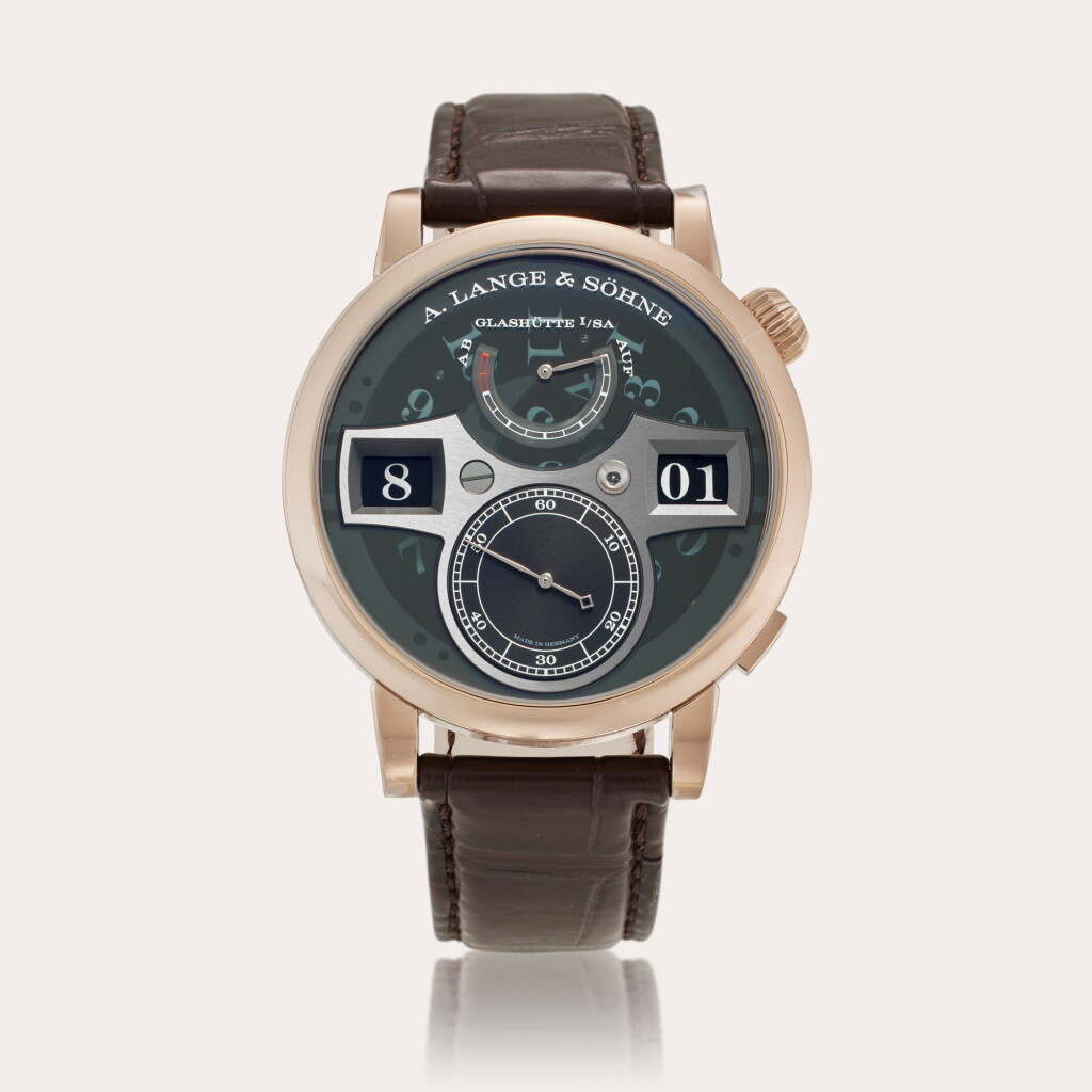 View full screen - View 1 of Lot 107. Reference 142.055 Zeitwerk 'Lumen' Honeygold | A limited edition honey gold wristwatch with semi-transparent dial, digital jumping numerals and power reserve indication, Circa 2023.