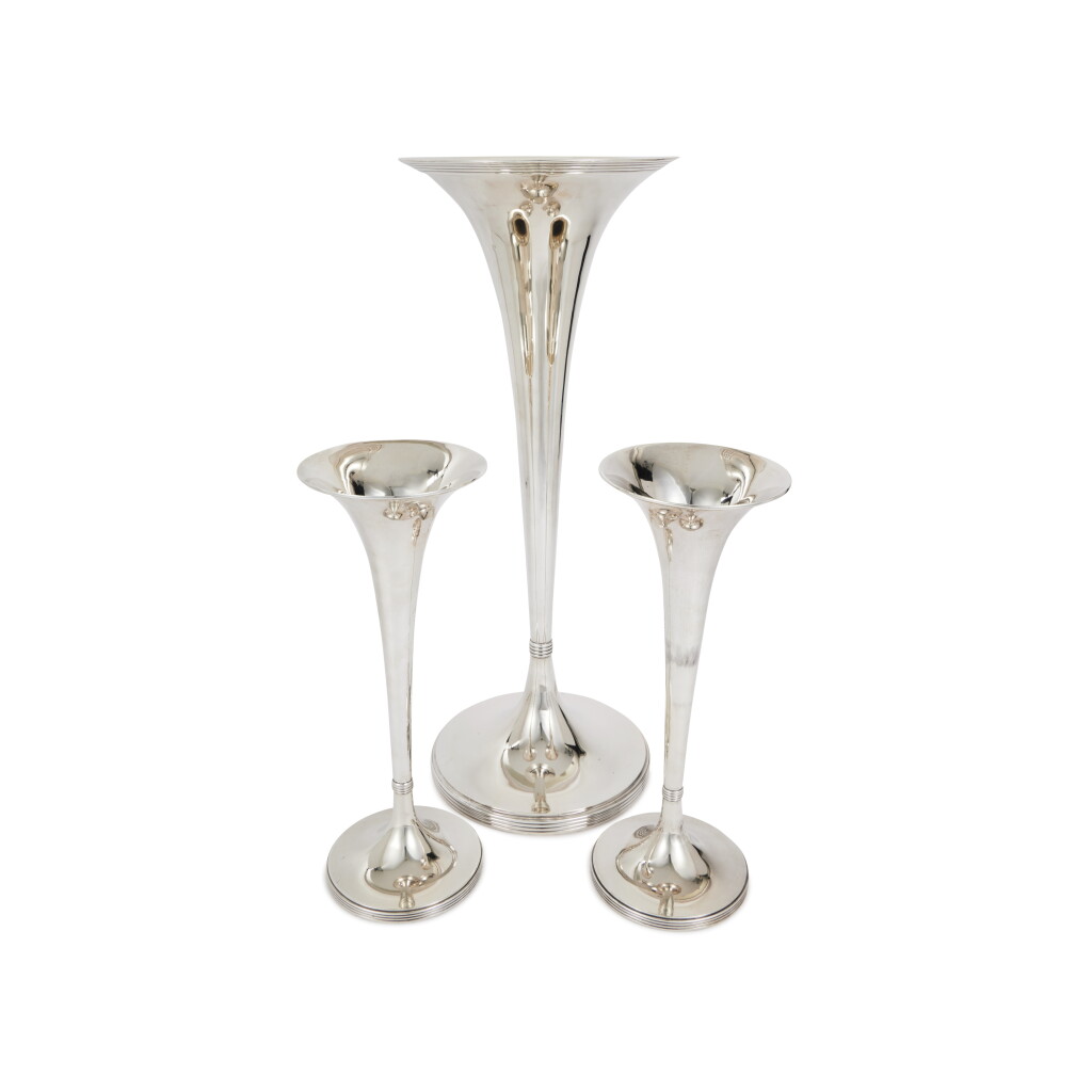 View full screen - View 1 of Lot 1198. A Set of Three American Silver Trumpet Vases, J.E. Caldwell, Philadelphia, Circa 1930.