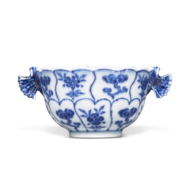 View full screen - View 1 of Lot 108. A blue and white 'floral' handled wine cup, Mark and period of Yongzheng | 清雍正 青花仙芝花卉紋雙耳盃 《大清雍正年製》款.