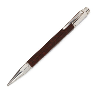 View full screen - View 1 of Lot 112. CARAN D'ACHE | A STAINLESS STEEL AND WOOD BALLPOINT PEN CIRCA 2000.