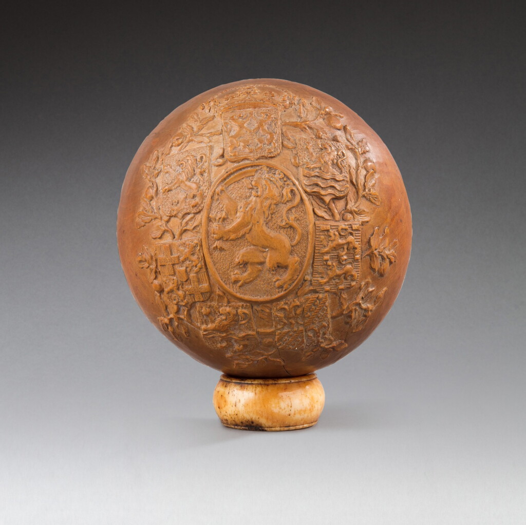 View full screen - View 1 of Lot 110. Netherlands, probably 18th century, A carved sphere with the coats of arms of the provinces of the Netherlands | Pays-Bas, probablement XVIIIe siècle, Sphère sculptée aux armes des provinces des pays-bas .