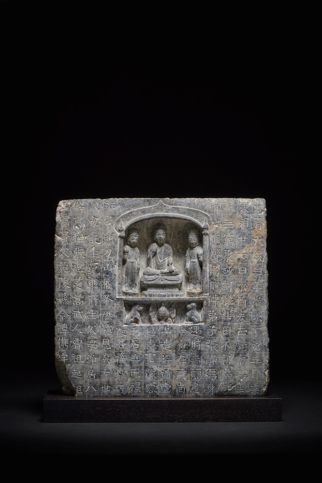 View full screen - View 1 of Lot 156. An inscribed dark gray limestone Buddhist stele, Northern Qi dynasty, dated Tiantong 3rd year, corresponding to 567.