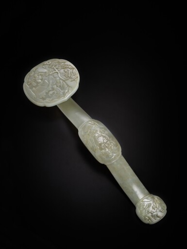 View full screen - View 1 of Lot 217. A pale celadon jade ruyi scepter, Qing dynasty, 19th century | 清十九世紀 青白玉雕八仙圖如意.