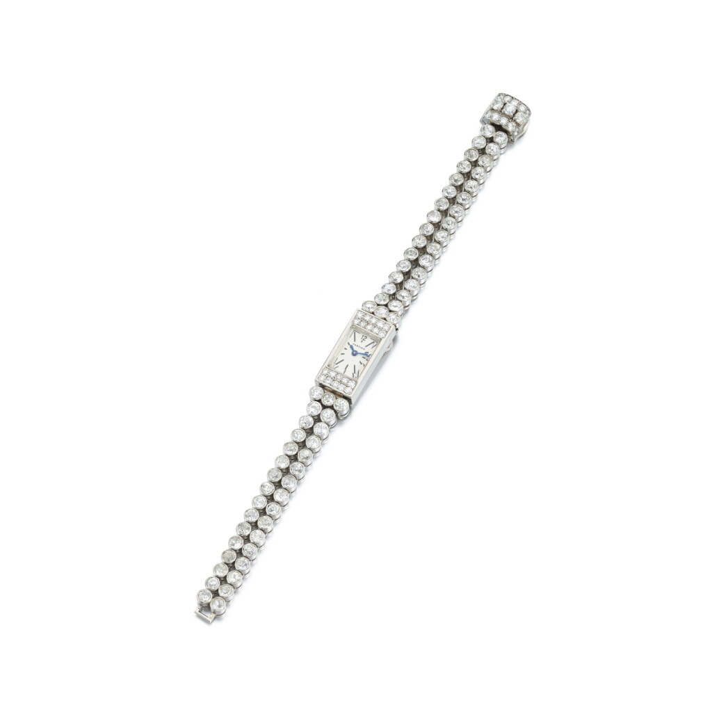 View full screen - View 1 of Lot 319. A Platinum and Diamond-set Bracelet Watch | Circa 1958.