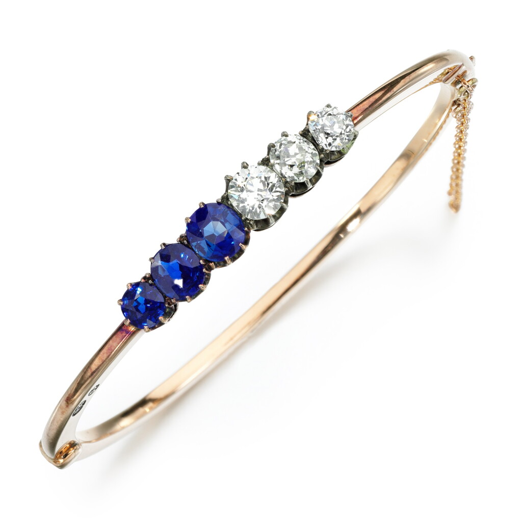 View full screen - View 1 of Lot 8. Sapphire and diamond bangle, 1890s.
