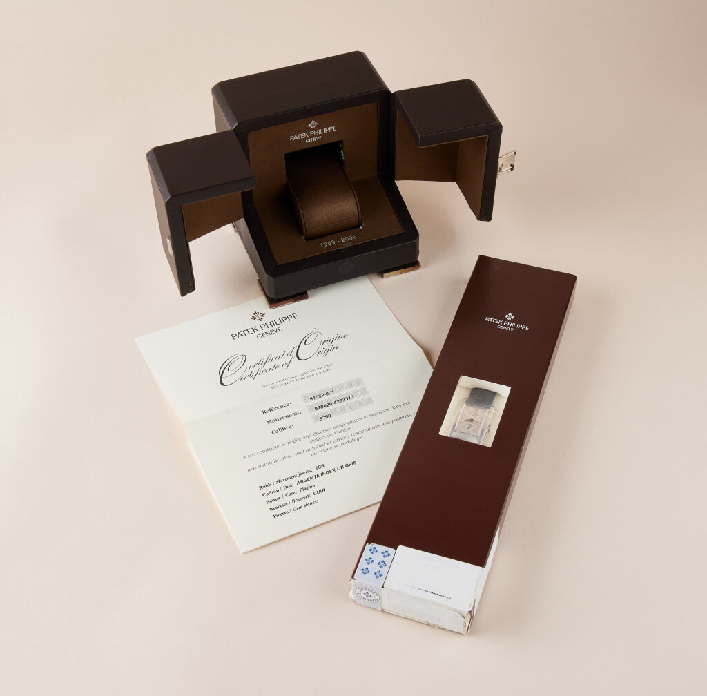 View full screen - View 1 of Lot 2165. Reference 5105 | A limited edition platinum wristwatch, Made to commemorate the opening of Patek Philippe's salon in Geneva, In double factory seal, Circa 2006.
