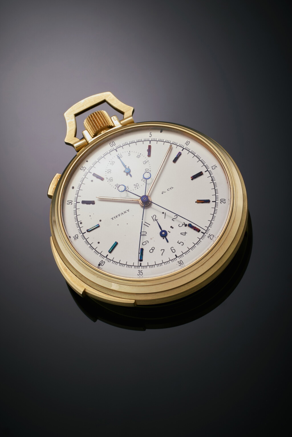 View full screen - View 1 of Lot 53. Retailed by Tiffany & Co.: A yellow gold open-faced keyless five-minute repeating watch with split seconds chronograph and register. Mvt. 112114. Case 19590. Made in 1901 and Sold in 1902.
