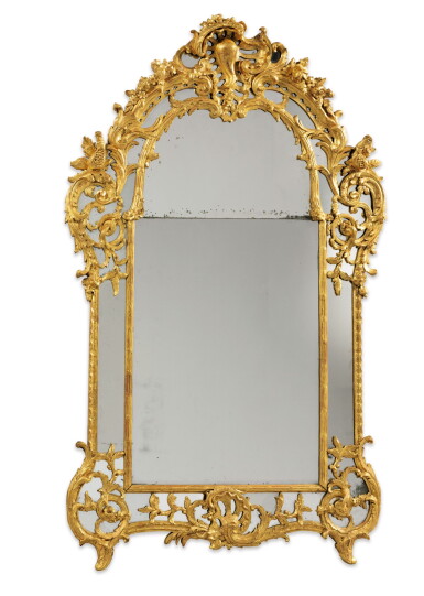 View full screen - View 1 of Lot 123. A CARVED GILTWOOD MIRROR, LOUIS XV, CIRCA 1740 | MIROIR À PARCLOSES EN BOIS SCULPTÉ ET DORÉ D'ÉPOQUE LOUIS XV, VERS 1740.