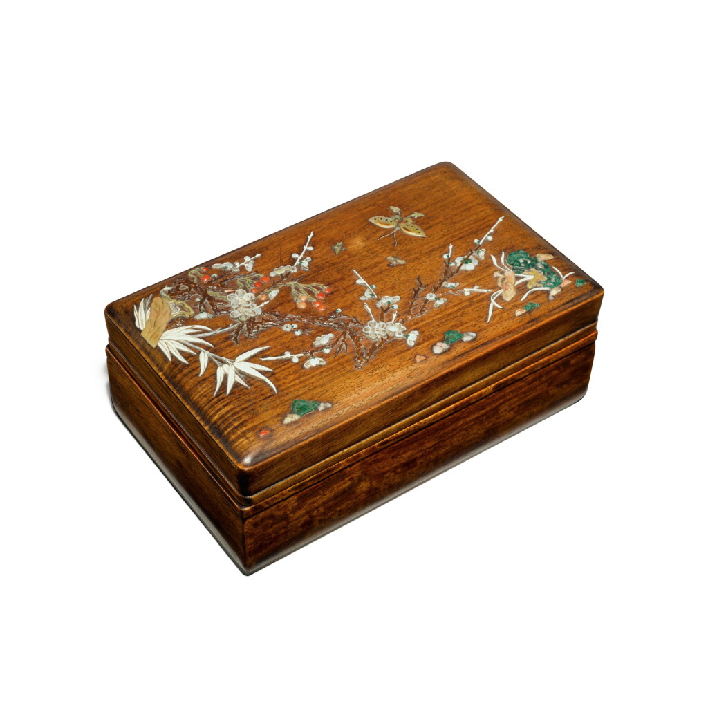 View full screen - View 1 of Lot 122. An embellished 'huanghuali' box and cover, Qing dynasty, 17th / 18th century | 清十七 / 十八世紀 黃花梨嵌寶花蝶圖蓋盒.