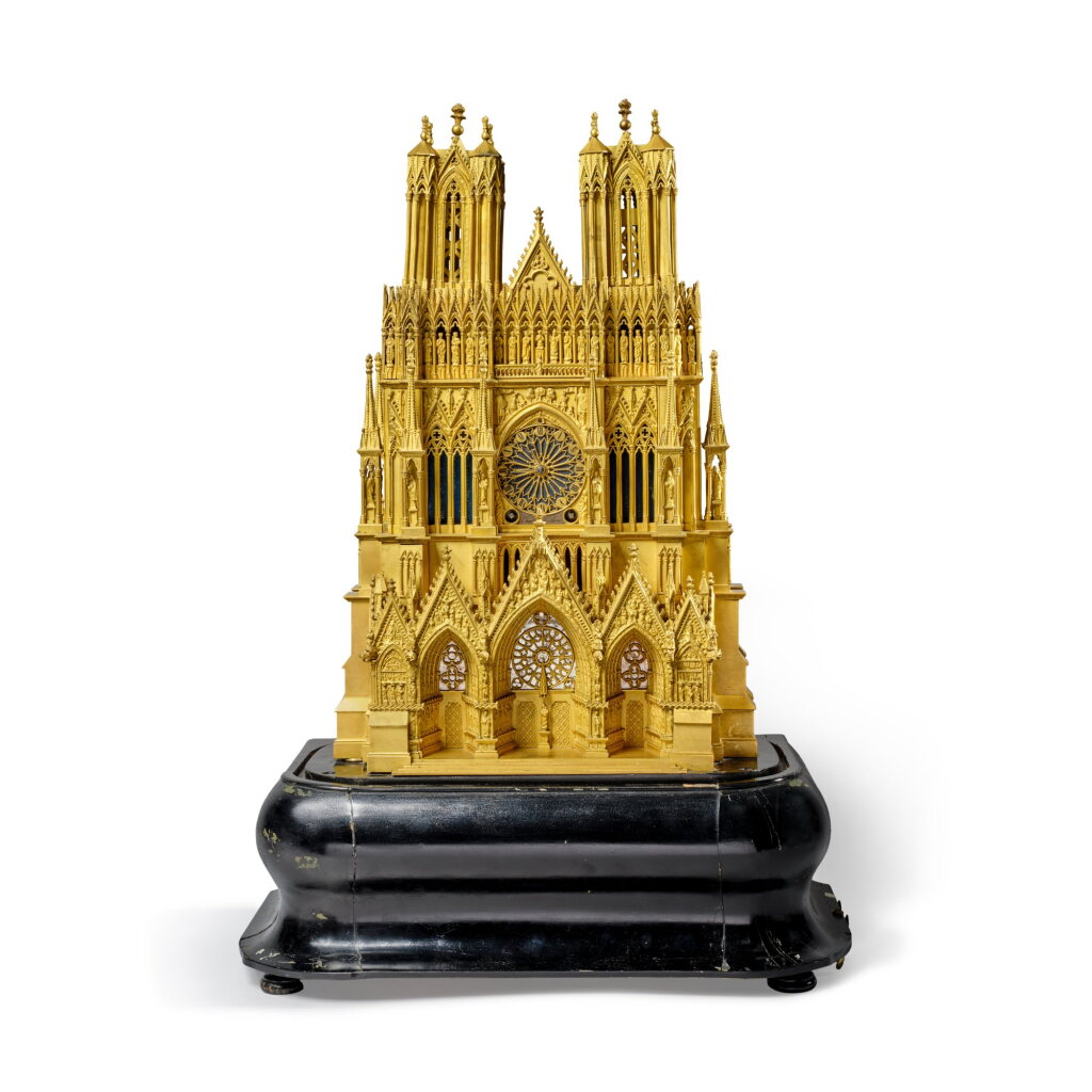 View full screen - View 1 of Lot 164. A Louis Philippe Gilt-Bronze Musical Clock in the Shape of the Cathedral of Reims, Circa 1840.