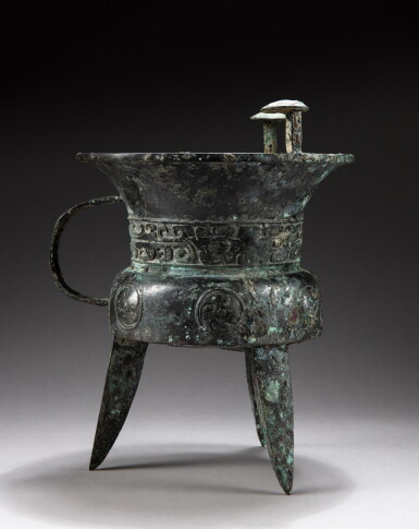 View full screen - View 1 of Lot 86. A rare and important archaic bronze goblet, Jia Early Shang dynasty | 商期 青銅饕餮紋斝 .