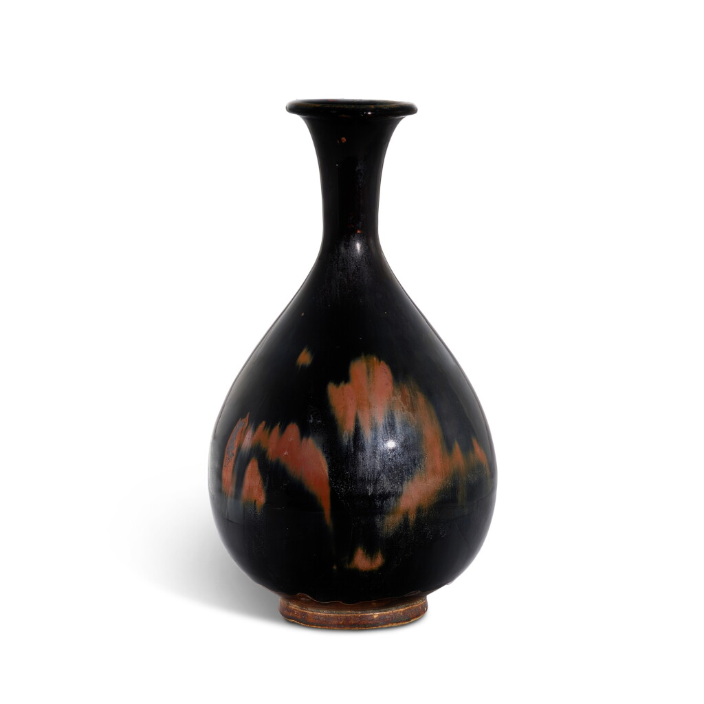 View full screen - View 1 of Lot 420. A russet-splashed black-glazed bottle vase, Yuhuchunping, Northern Song – Jin dynasty 北宋至金 黑釉褐斑玉壺春瓶.