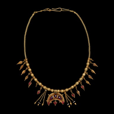 View full screen - View 1 of Lot 69. A Hellenistic Gold, Garnet and Green Glass Necklace, circa 2nd/1st century B.C..