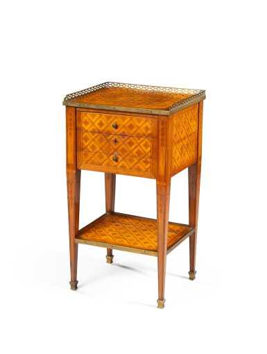 View full screen - View 1 of Lot 124. A Louis XVI maple, holly and sycamore marquetred table en chiffonnière, circa 1780, stamped by Godefroy Dester.