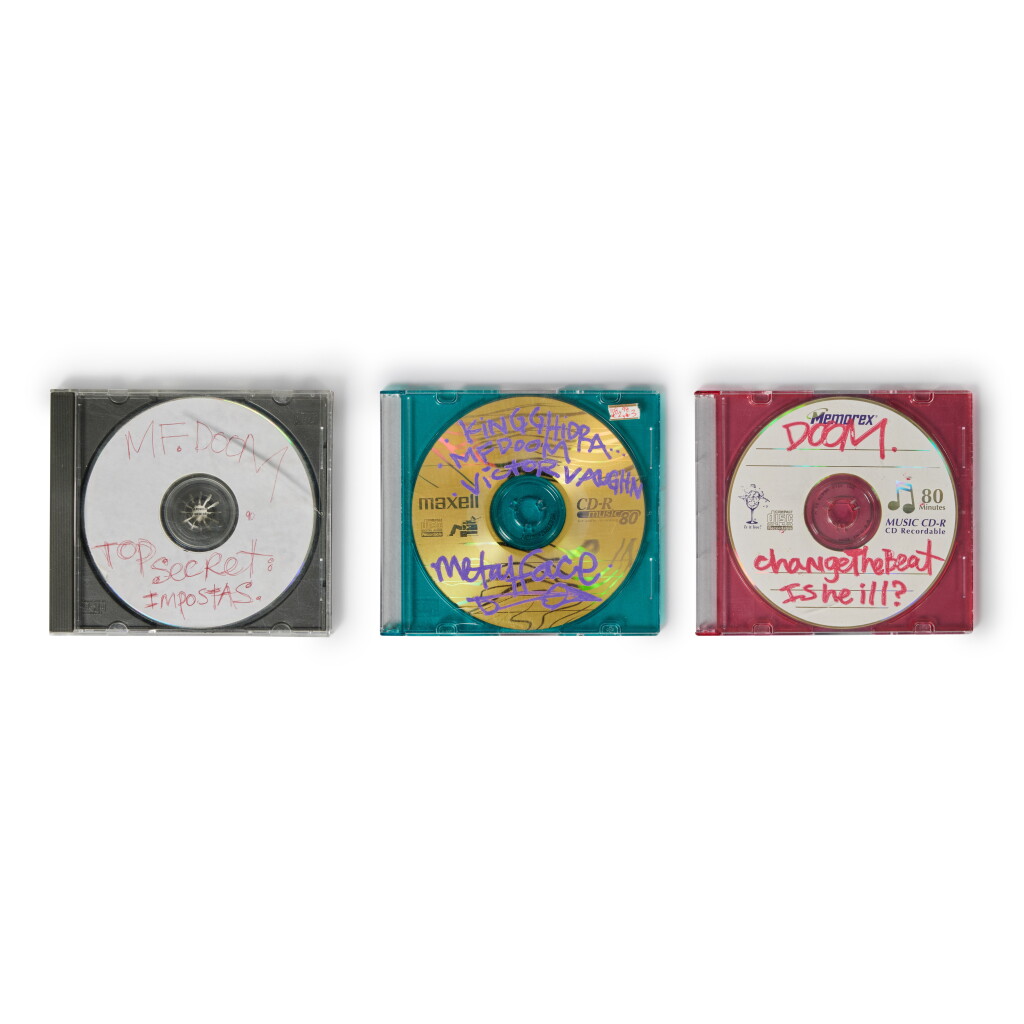 View full screen - View 1 of Lot 123. Three MF DOOM demo CD-Rs, hand-labeled by MF DOOM.