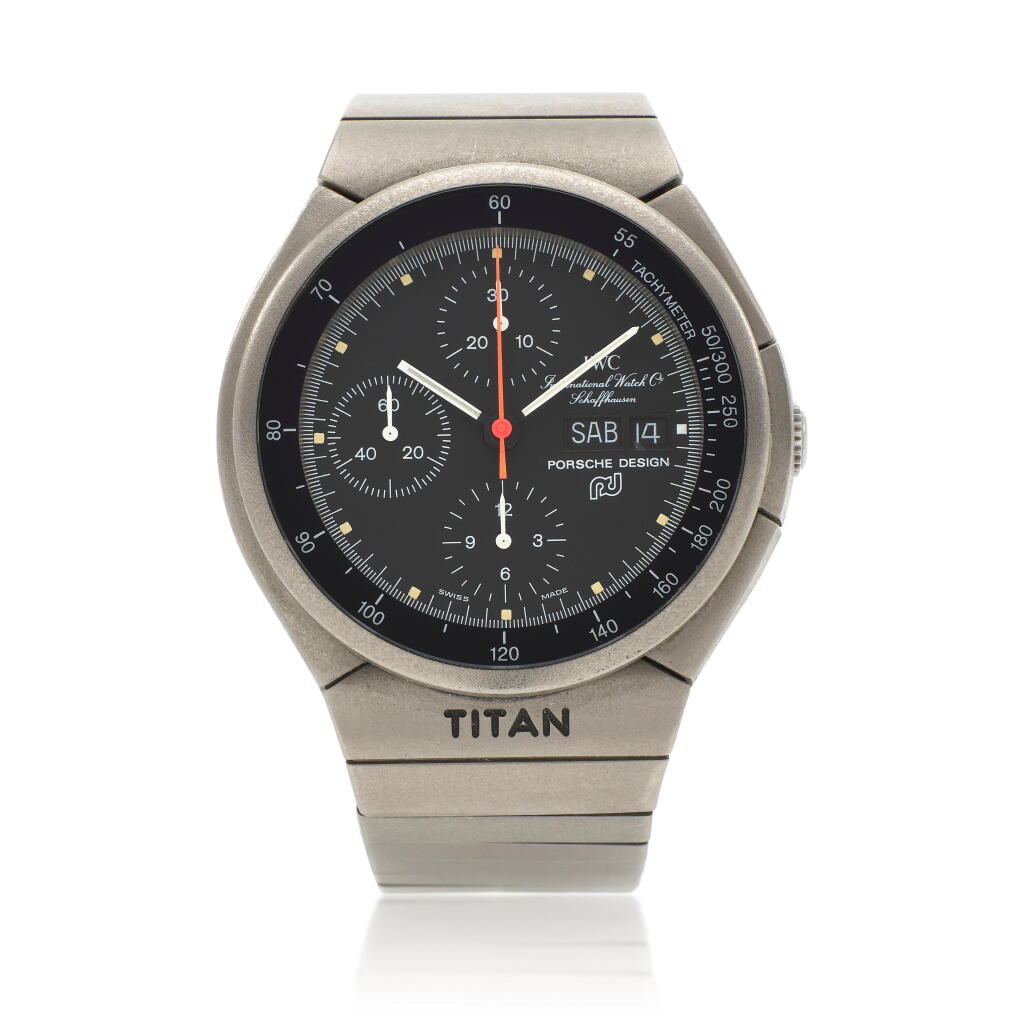 View full screen - View 1 of Lot 232. Titan, Reference IW3700 | A titanium chronograph wristwatch with day, date and bracelet | Circa 1980.