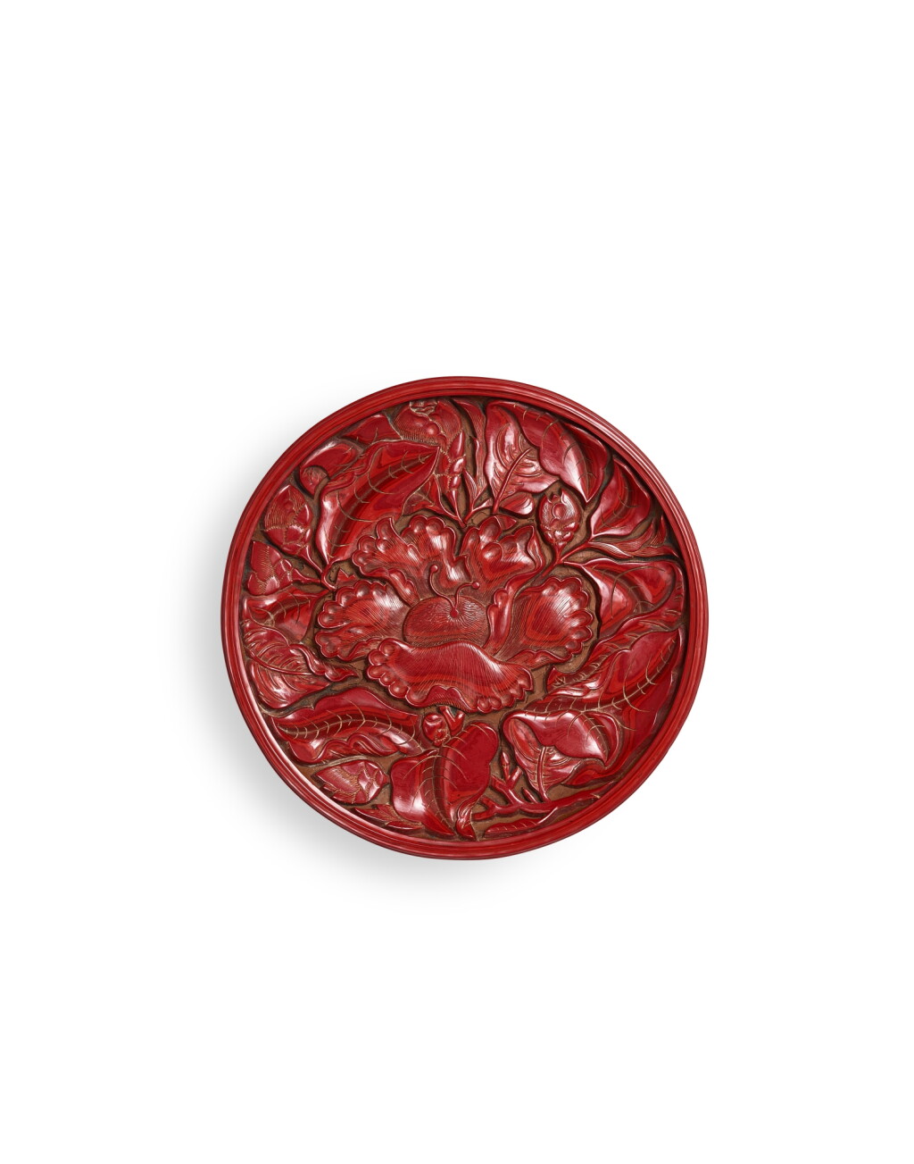 View full screen - View 1 of Lot 5075. A carved cinnabar lacquer 'camellia' dish, Yuan dynasty | 元 剔紅茶花紋盤.