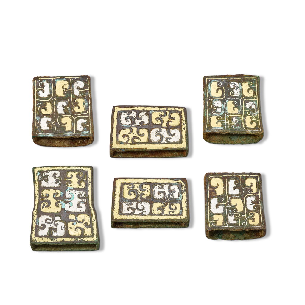 View full screen - View 1 of Lot 874. A group of six gold and silver-inlaid bronze fittings, Eastern Zhou dynasty, Warring States period 東周戰國時期 銅錯金銀車馬飾一組六件.