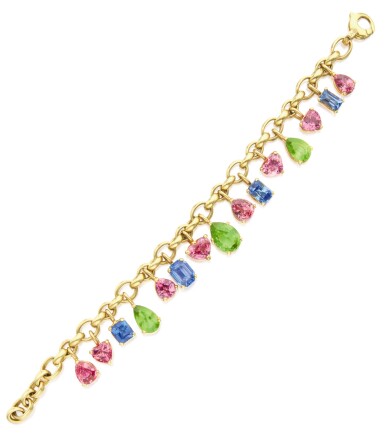 View full screen - View 1 of Lot 398. GOLD AND GEM-SET CHARM BRACELET, BULGARI.