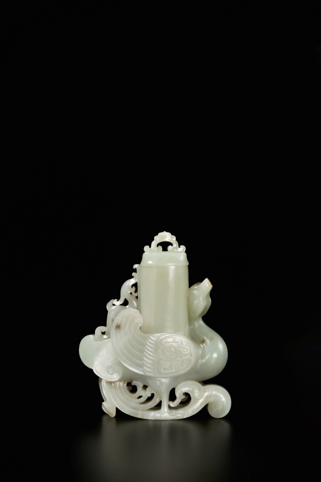 View full screen - View 1 of Lot 79. A pale celadon jade 'phoenix' vase and cover, Qing dynasty, Qianlong period.