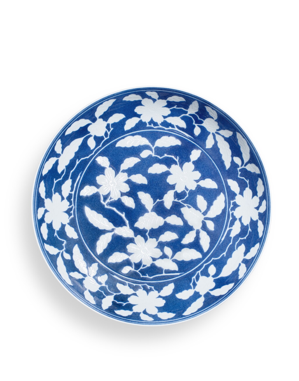 View full screen - View 1 of Lot 9839. A reserve-decorated powder-blue 'gardenia' dish, Mark and period of Yongzheng | 清雍正 灑藍地白花梔子花紋盤 《大清雍正年製》款.