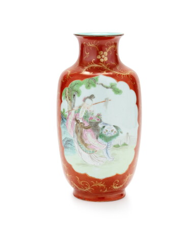 View full screen - View 1 of Lot 180. An iron-red ground famille rose lantern vase mark and period of Qianlong | 清乾隆 礬紅地開光粉彩何仙姑、山水樓閣圖燈籠瓶 《大清乾隆年製》款.