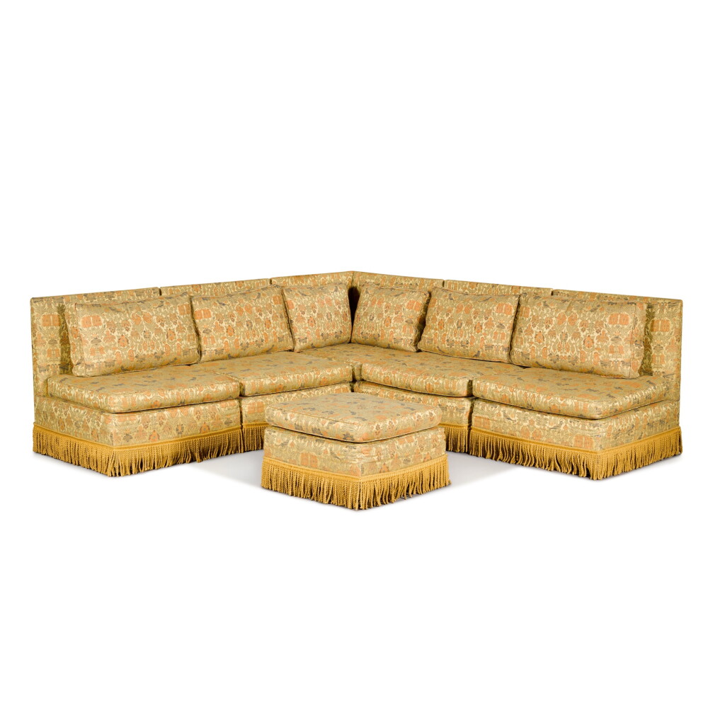View full screen - View 1 of Lot 658. An L-shaped modular settee designed by Robin Moore Ede, circa 1986.