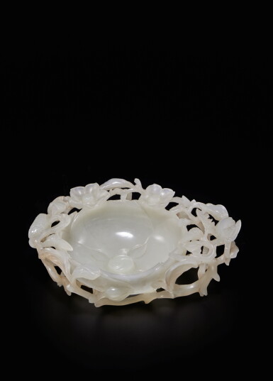 View full screen - View 1 of Lot 485. A white jade 'bird and flowers' washer, 17th century | 十七世紀 白玉鏤雕穿花鳥紋洗.