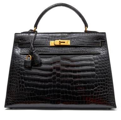 View full screen - View 1 of Lot 1400. Black Shiny Porosus Crocodile Kelly 32 Sellier Gold Hardware, 1962.