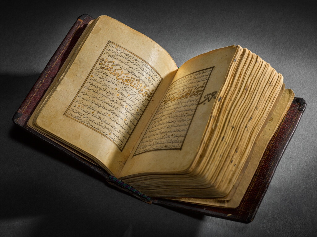 View full screen - View 1 of Lot 18. An illuminated miniature Qur'an, Iraq, 14th century.