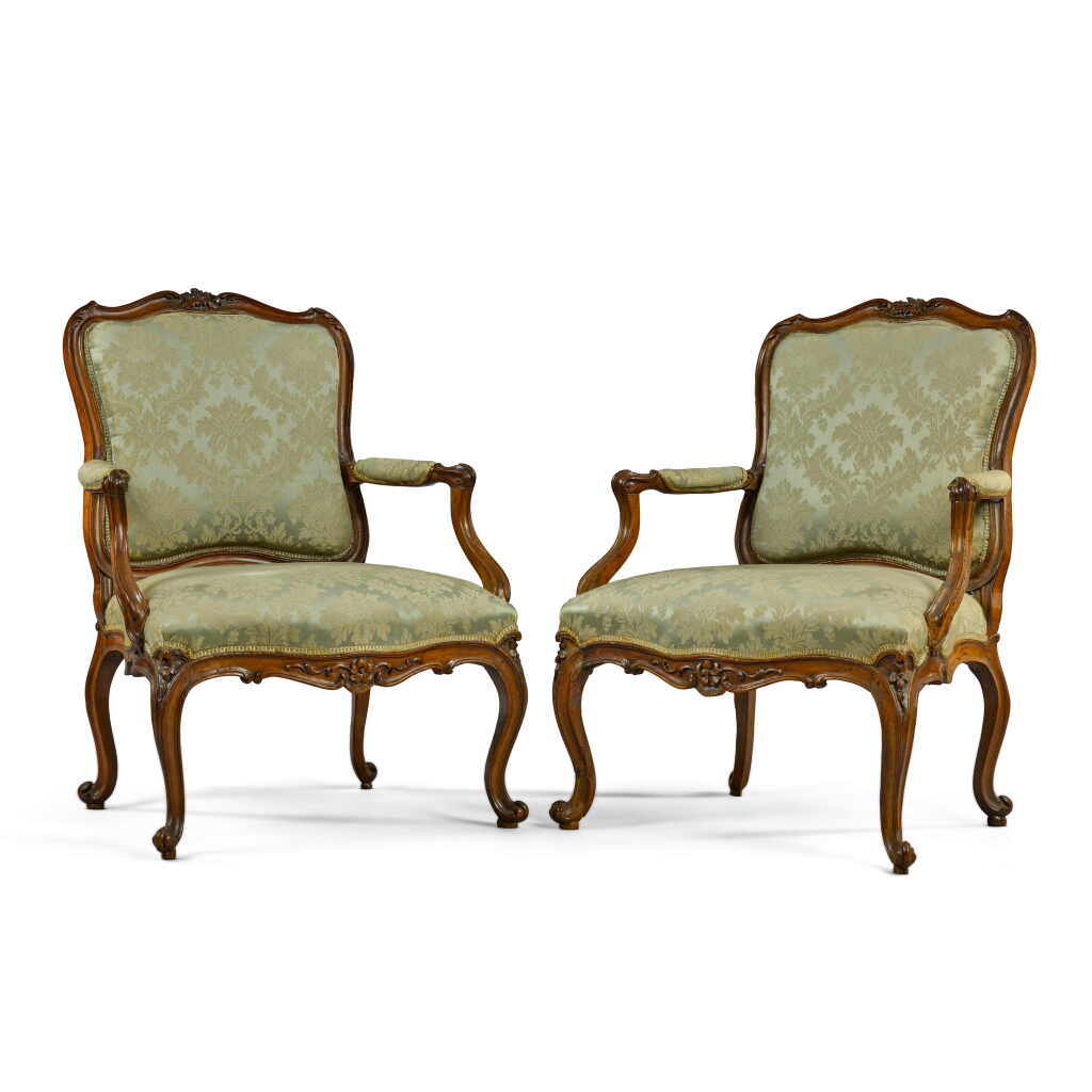 View full screen - View 1 of Lot 37. A pair of Louis XV carved walnut fauteuils en cabriolet, circa 1760.