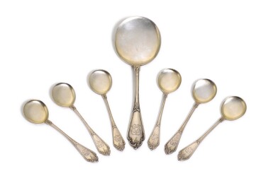 View full screen - View 1 of Lot 86. A SET OF SIX PARCEL-GILT CAVIAR SPOONS AND A MATCHING SERVING SPOON, FABERGÉ, MOSCOW, CIRCA 1900.
