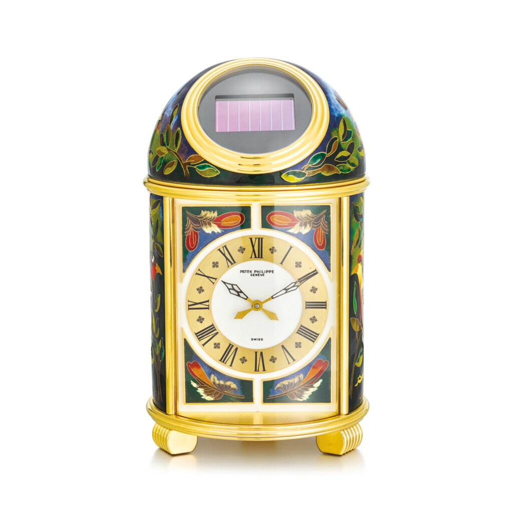 View full screen - View 1 of Lot 2260. PATEK PHILIPPE | LES FAISANS, REFERENCE 1426M-001 A UNIQUE AND EXTREMELY ATTRACTIVE GILT BRASS SOLAR POWERED DOME TABLE CLOCK WITH CLOISONNÉ ENAMEL, MADE IN 1995 " | 百達翡麗 | Les Faisans 型號1426M-001 獨一無二及極為吸引鍍金銅製太陽能座鐘,備掐絲琺瑯,機芯編號1804688,1995年製".