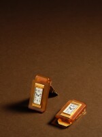 An unusual yellow gold and bakelite easel-form clip watch, Circa 1930