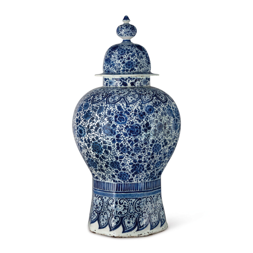 View full screen - View 1 of Lot 514. A DUTCH DELFT BLUE AND WHITE LARGE OCTAGONAL BALUSTER VASE AND COVER, CIRCA 1700.