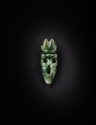 View full screen - View 1 of Lot 89. A green jade 'humanoid figure' pendant, Neolithic period, Hongshan culture | 新石器時代 紅山文化玉雕神人.
