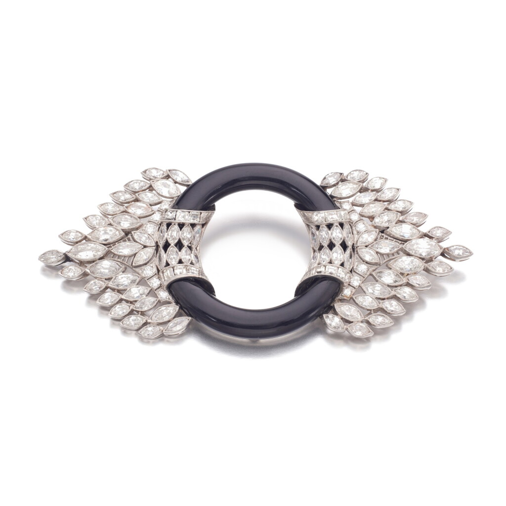 View full screen - View 1 of Lot 707. Onyx and diamond brooch, 1920s.