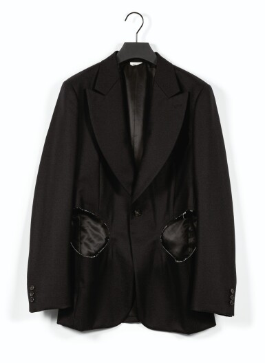 View full screen - View 1 of Lot 699. Black Wool Jacket, 2014 | Veste en laine noire ajourée de cercles, 2014.