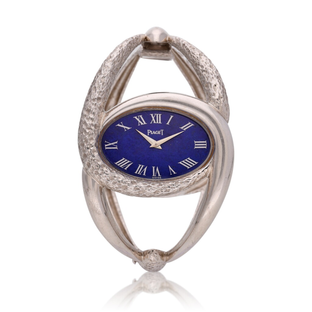 View full screen - View 1 of Lot 263. Reference 9850 D 38 | A white gold bracelet watch with lapis lazuli dial, Circa 1970.