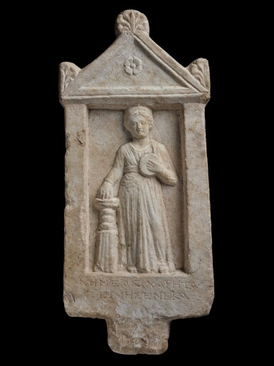 View full screen - View 1 of Lot 28. A Marble Funerary Stele inscribed for Demea and Time, circa 1st Century B.C./1st Century A.D..