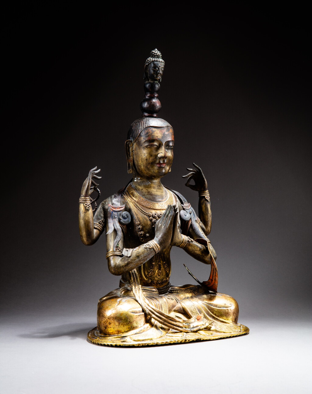 View full screen - View 1 of Lot 103. A large copper-alloy repoussé figure of Sadaksari Avalokiteshvara, Inner Mongolia, probably Dolonor, 18th century | 內蒙古 或多洛諾 十八世紀 銅合金四臂觀世音菩薩坐像.