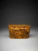 A small marbled pottery pillow, Tang dynasty | 唐 黃釉絞胎枕