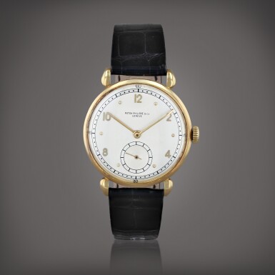 View full screen - View 1 of Lot 387. Calatrava 'large teardrop lugs', reference 1509 Montre bracelet en or jaune | Yellow gold wristwatch Vers 1942 | Circa 1942.