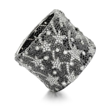 View full screen - View 1 of Lot 169. Diamond and black diamond cuff bracelet.
