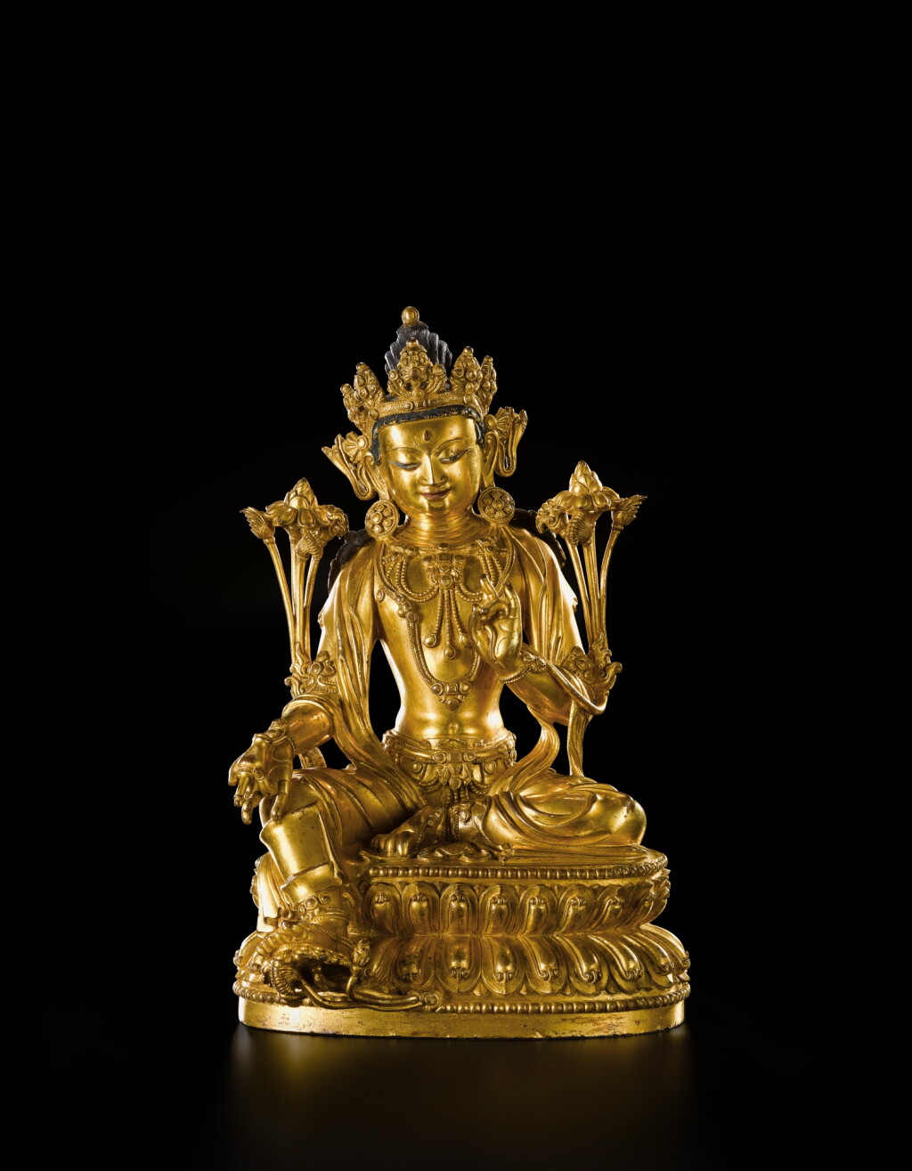View full screen - View 1 of Lot 3607. A rare gilt-bronze seated figure of Avalokiteshvara, Mark and period of Yongle | 明永樂 鎏金銅觀世音菩薩坐像 《大明永樂年施》款.