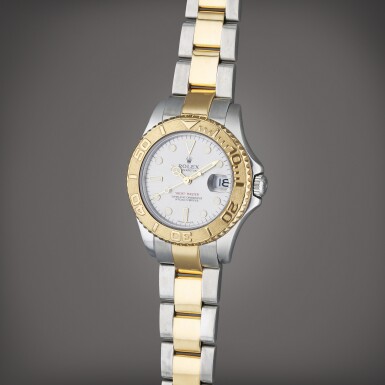 View full screen - View 1 of Lot 110. Reference 168623 Yacht-Master | A yellow gold and stainless steel automatic wristwatch with date and bracelet, Circa 2002.