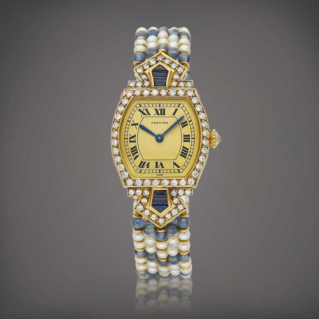 View full screen - View 1 of Lot 8786. Tortue | A yellow gold, sapphire and diamond-set bracelet watch with sapphire bead and cultured pearl bracelet, Circa 1990 | 卡地亞 | Tortue | 黃金鑲藍寶石及鑽石鏈帶腕錶,備藍寶石及珍珠鏈帶,約1990年製.