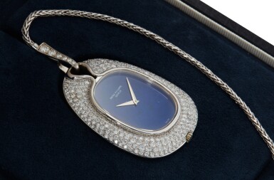View full screen - View 1 of Lot 45. Reference 879 Ellipse Joallerie Pendant | A white gold and diamond-set open faced pendant watch with lapis lazuli dial, Circa 1976 | 百達翡麗 879 型號 Ellipse Joallerie Pendant | 白金鑲鑽石吊墜錶配青金石錶盤,約1976年製.